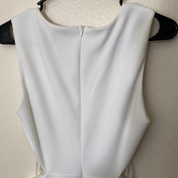 Lulu’s toast to you sleeveless white cut out skater mini dress - Picture 10 of 12